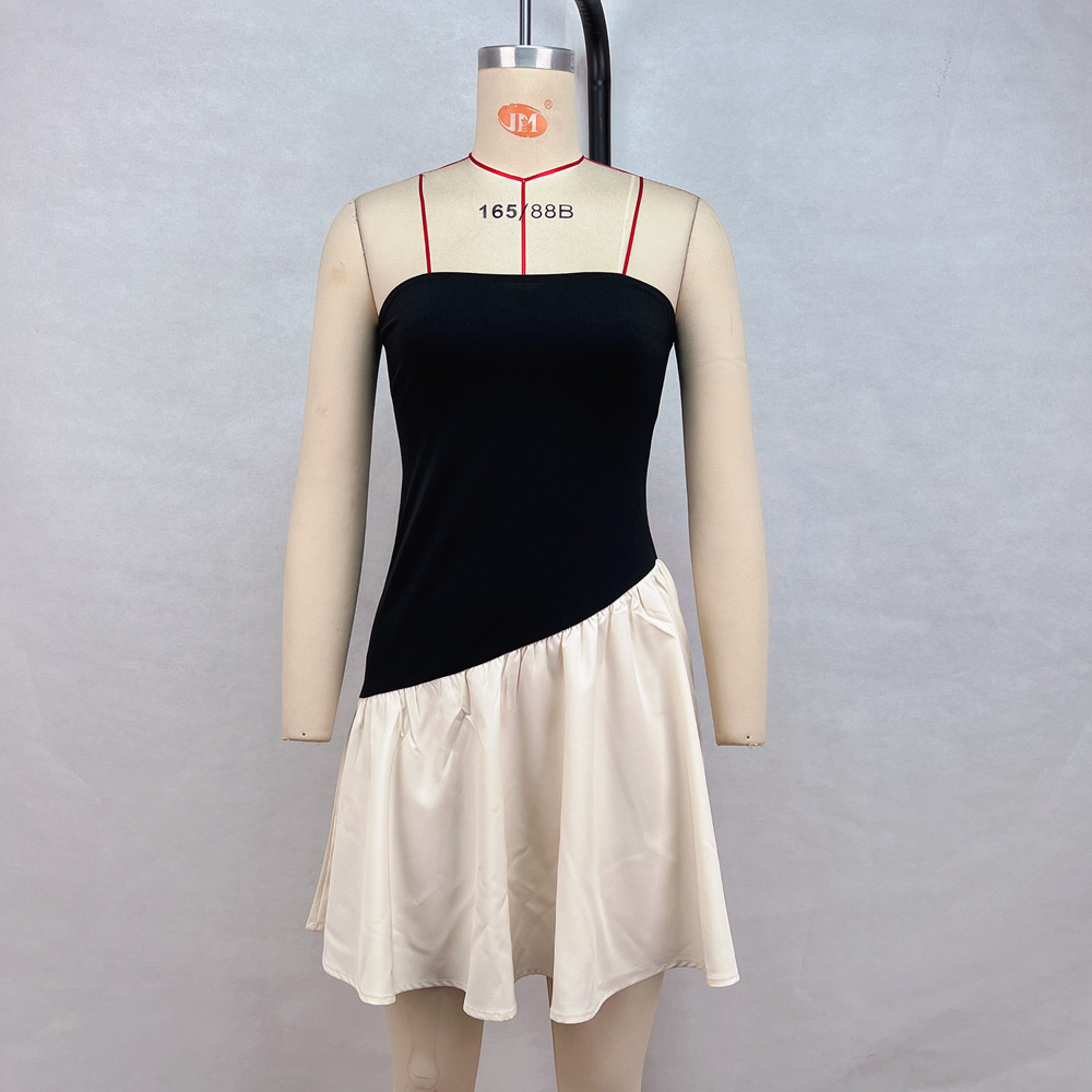 Women's pleated tube top dress in black, full length view showing slim fit and pleated skirt detail