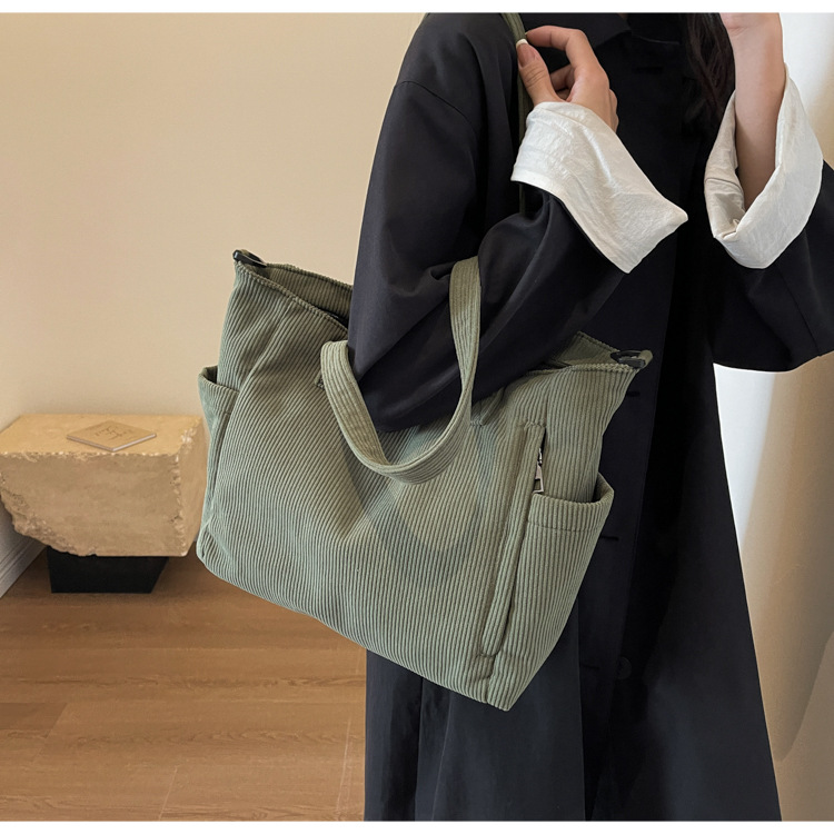 Large Capacity Art Student Shoulder Bag. Product information: Lining texture: Polyester, Applicable scenario: leisure travel, Color: creamy-white, green, black, Outer bag type: Sandwich pocket, Hardness: medium and soft, Material: corduroy, Suitcase shape