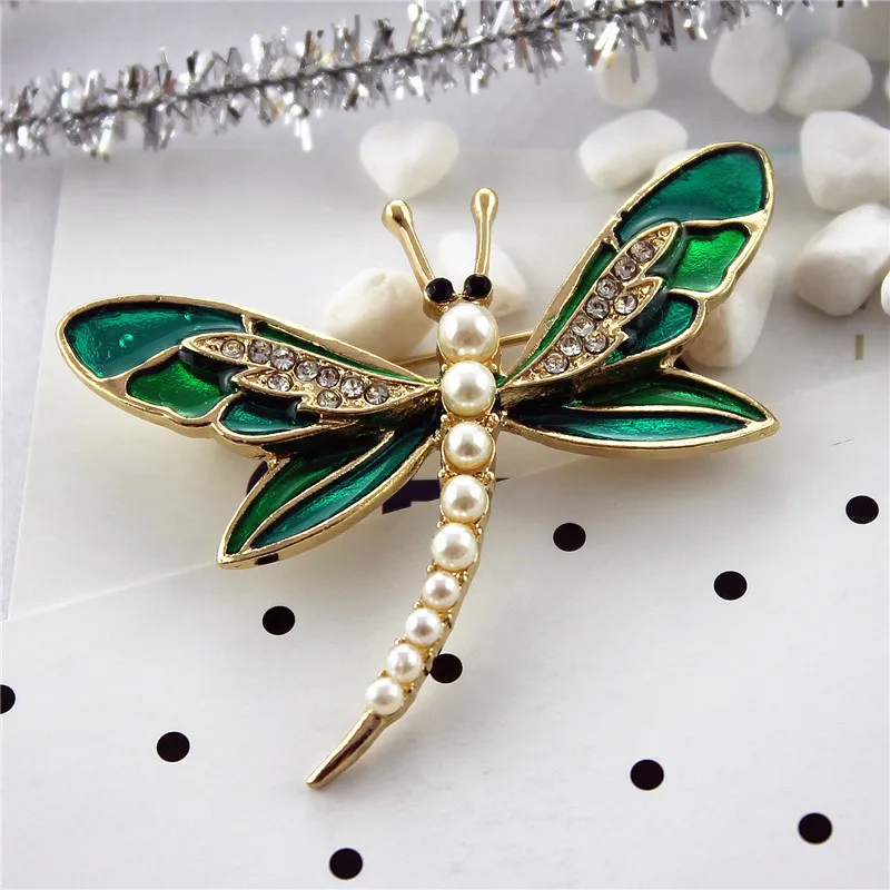 Title 5, Green dragonfly pin