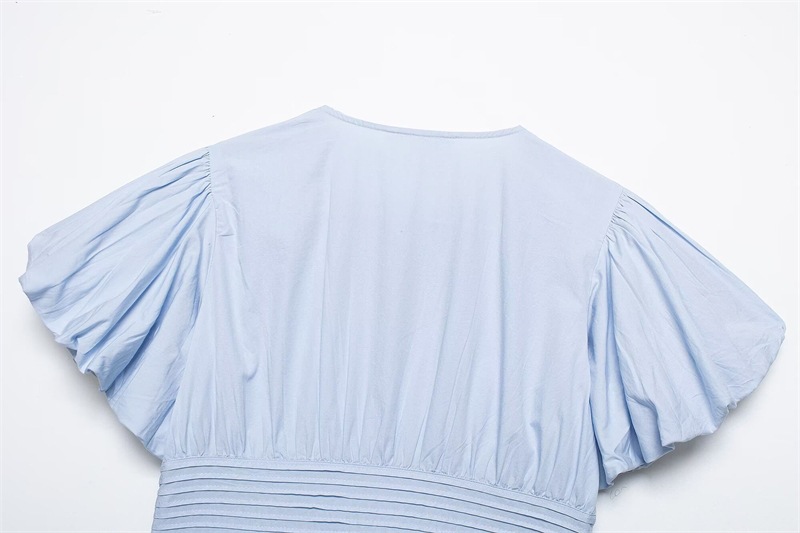 Women's puff-sleeve ruffle blouse in blue – slim-fit sleeveless elegant pullover