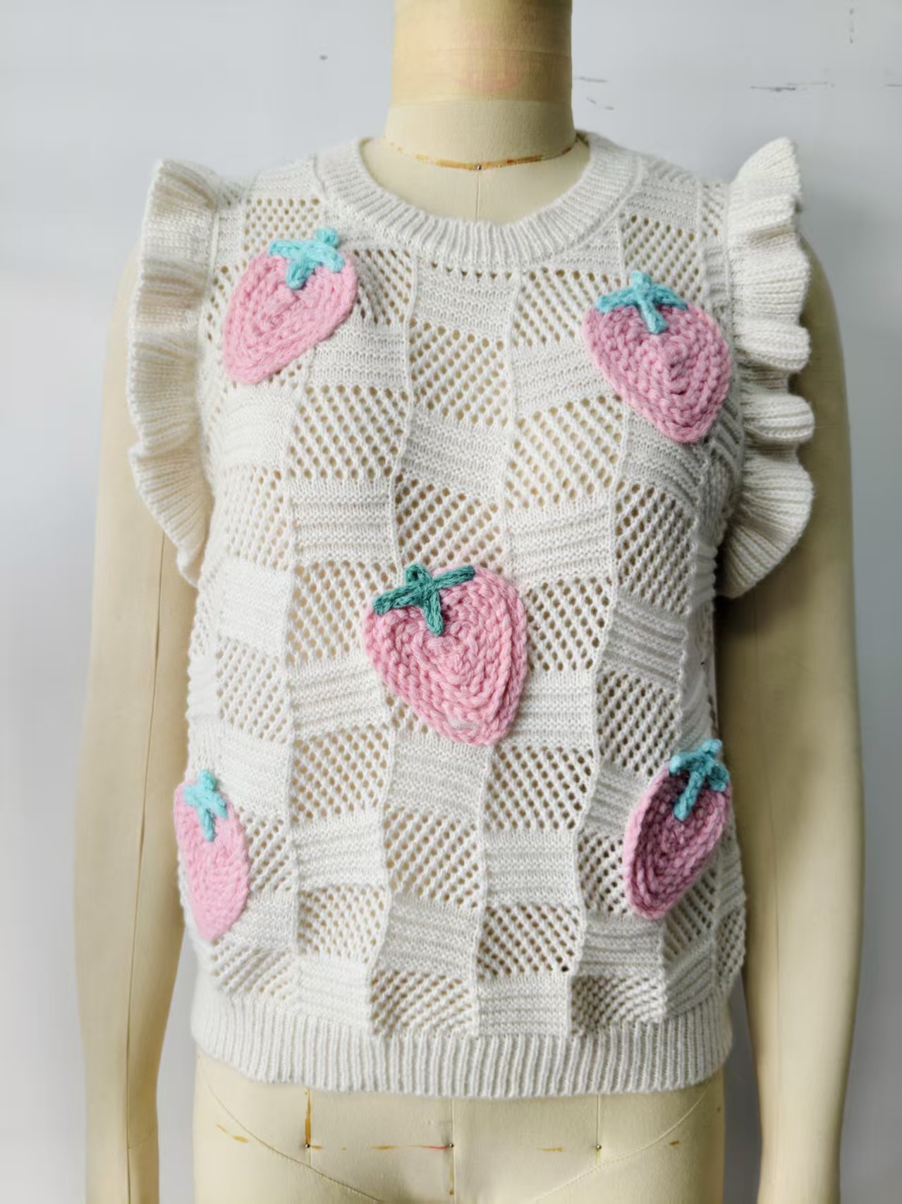Women's hollow-out knit vest in White – sleeveless loose pullover sweater top, front view