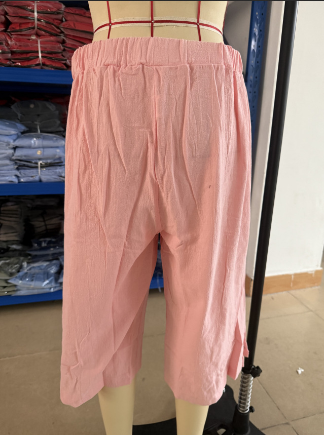 Women's button detail slit front pants – fabric and woven craftsmanship detail