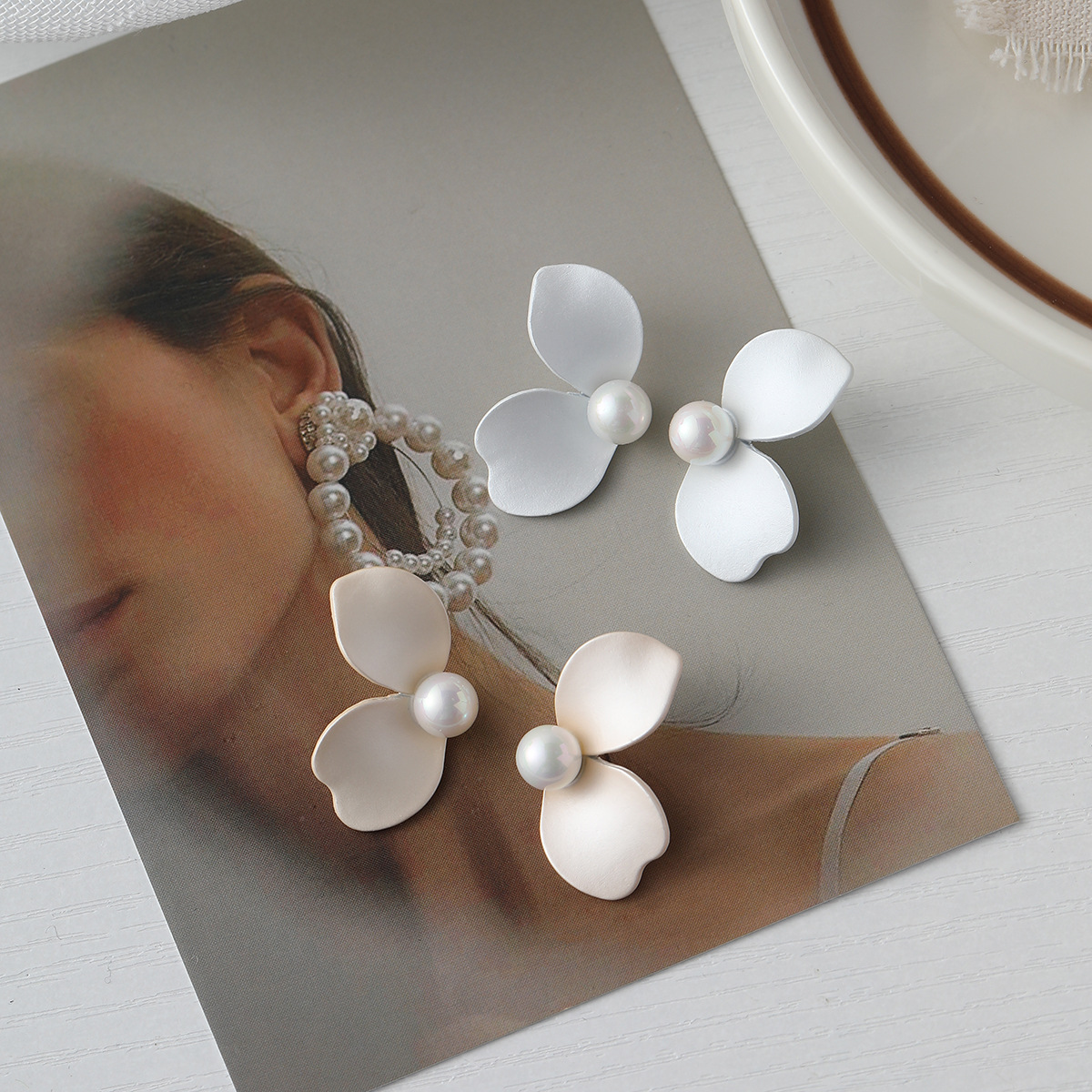 Mori Style Fresh Flower Stud Earrings. Product information: Color: two leaves White sterling silver stud earrings, two leaves beige sterling silver stud earrings, four leaves green sterling silver stud earrings, Clover White sterling silver stud earrings,