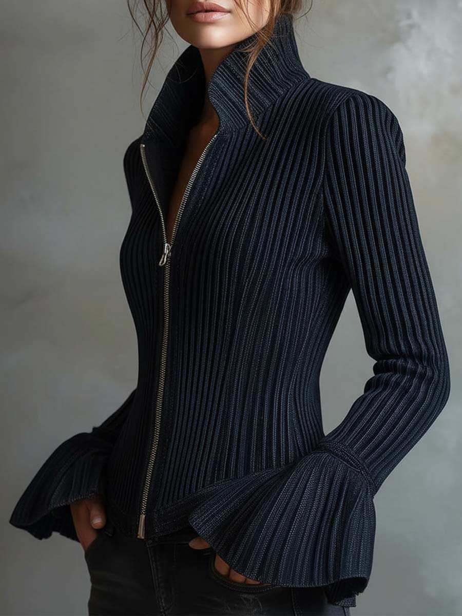 Women's slim-fit rib-knit top styled with jeans – elegant casual look with flared cuffs