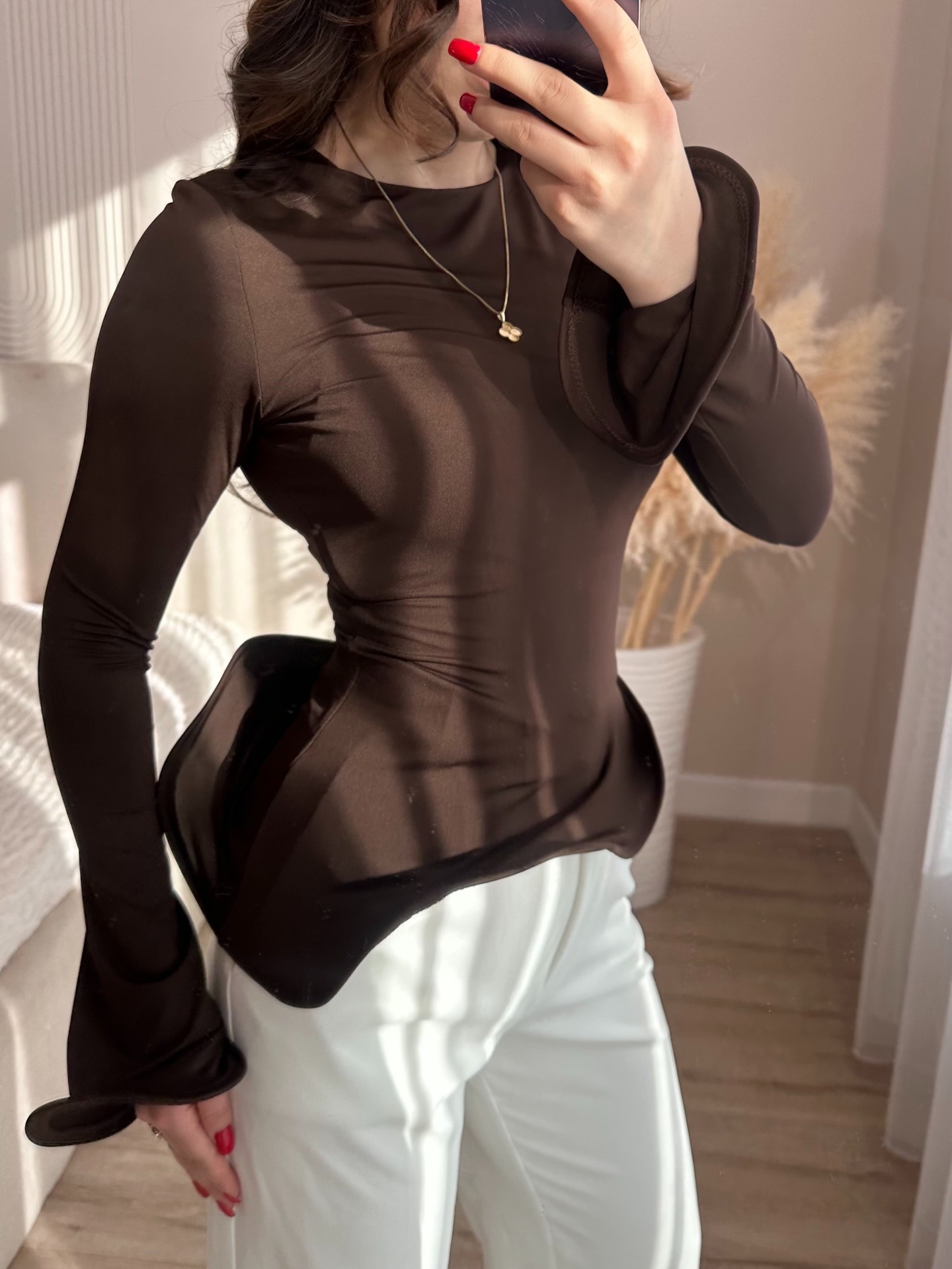 Crew-neck T-shirt With A Solid Color And An Asymmetrical Ruffled Hem