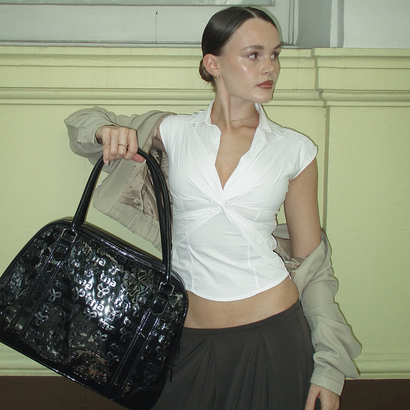 European And American Sexy V-neck Sleeveless Twisted Shirt