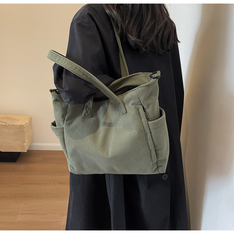 Large Capacity Art Student Shoulder Bag. Product information: Lining texture: Polyester, Applicable scenario: leisure travel, Color: creamy-white, green, black, Outer bag type: Sandwich pocket, Hardness: medium and soft, Material: corduroy, Suitcase shape