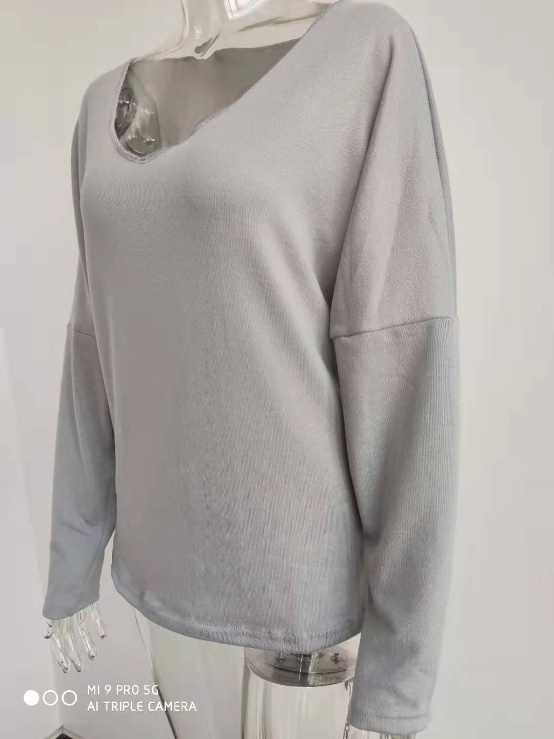 Title 13, Simple long sleeve V-neck pullover for women. A...