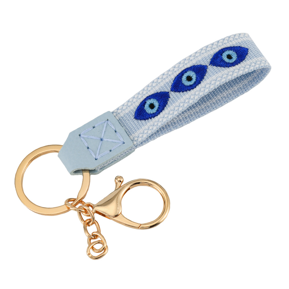 Devil's Eye Woven Bag Embroidery Leather Key Chain — image 1