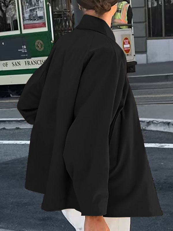 Women's mid-length coat – full outfit view on model