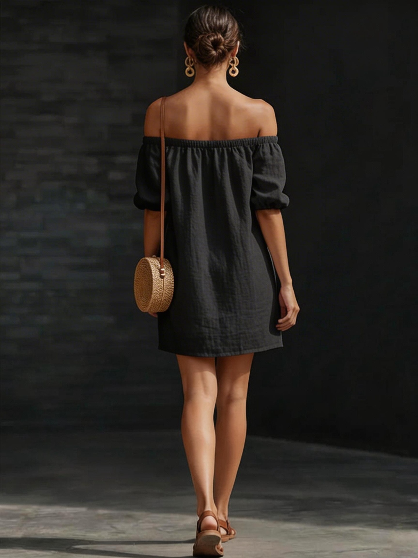 Women's loose mini dress in yellow, close-up of puff sleeve and off-shoulder detail