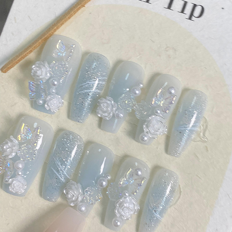 Handmade Wearable Nails In An Icy Translucent Camellia Design With A Blue-to-white Gradient