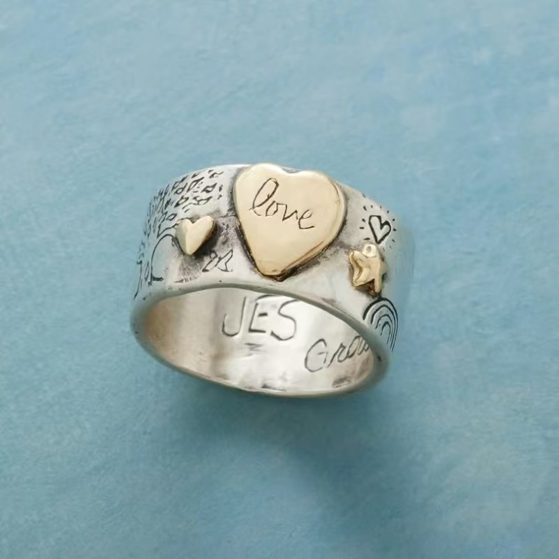 Fashionable Distressed Ring With Engraved Symbols