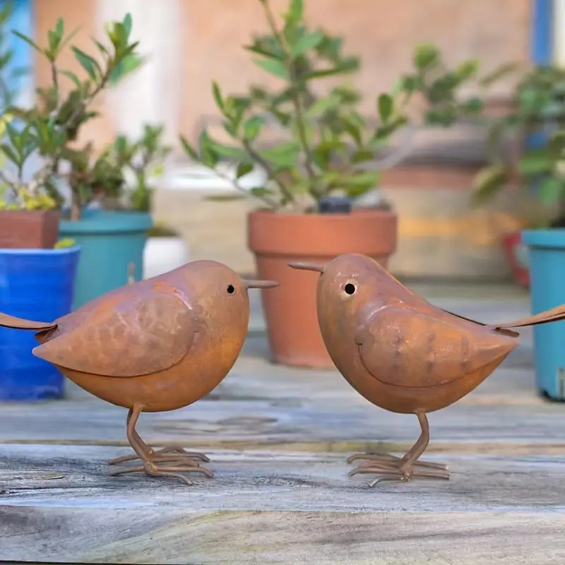 A Pair Of Metal Bird Decorative Ornaments