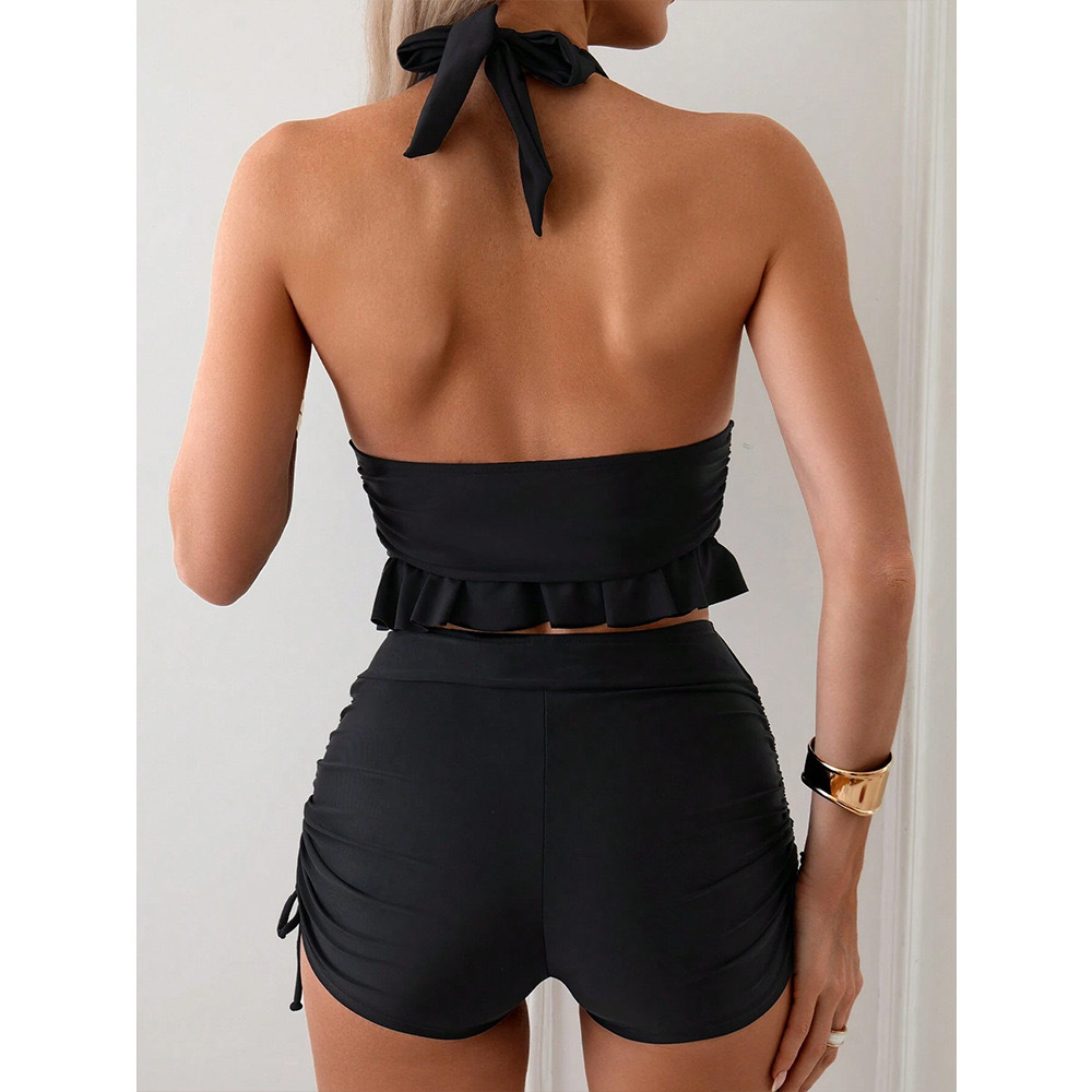 Lace-up bikini set in red, back view showing halterneck tie and ruffle bottoms