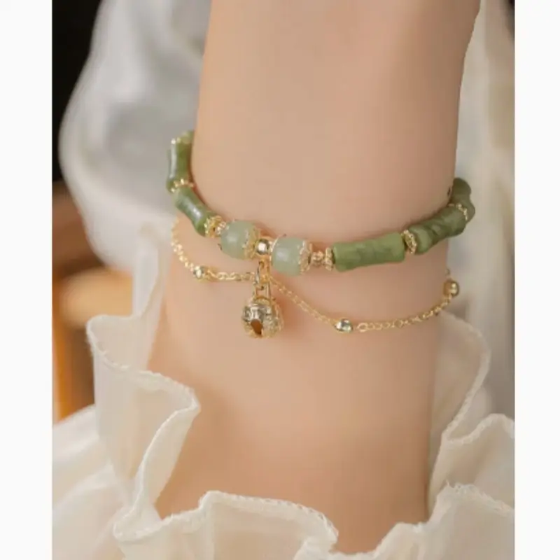 Women's Natural Stone Beaded Bracelet with Bell Charm and Gold Tone Chain