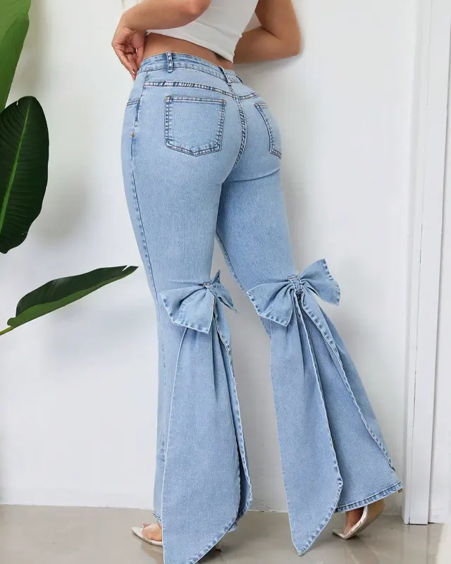 Womens High Waisted Stretchy Denim Flared Jeans With A Bow Detail Blue - Shop at LoveMi