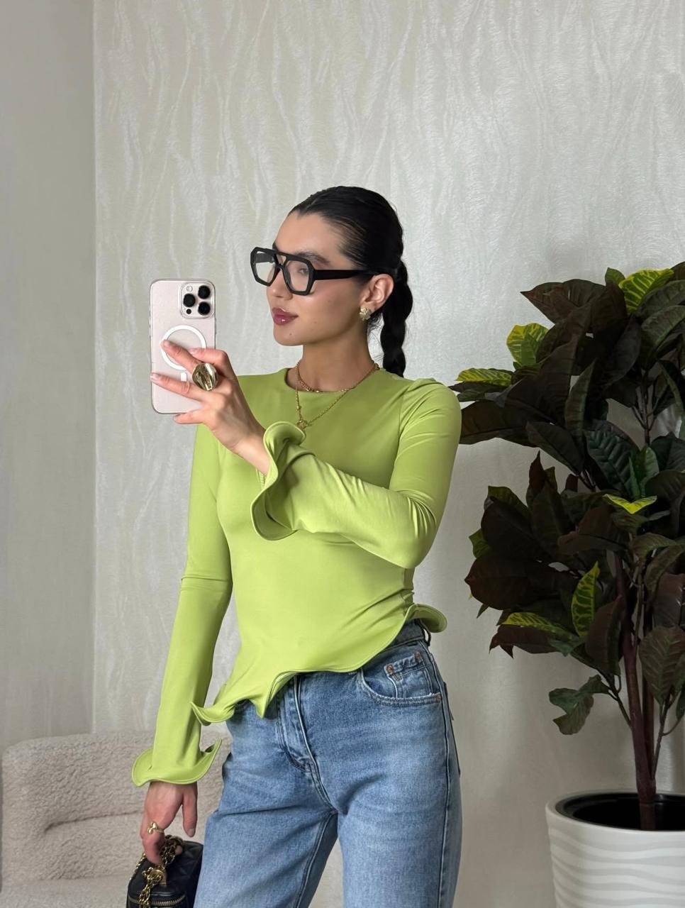 Crew-neck T-shirt With A Solid Color And An Asymmetrical Ruffled Hem