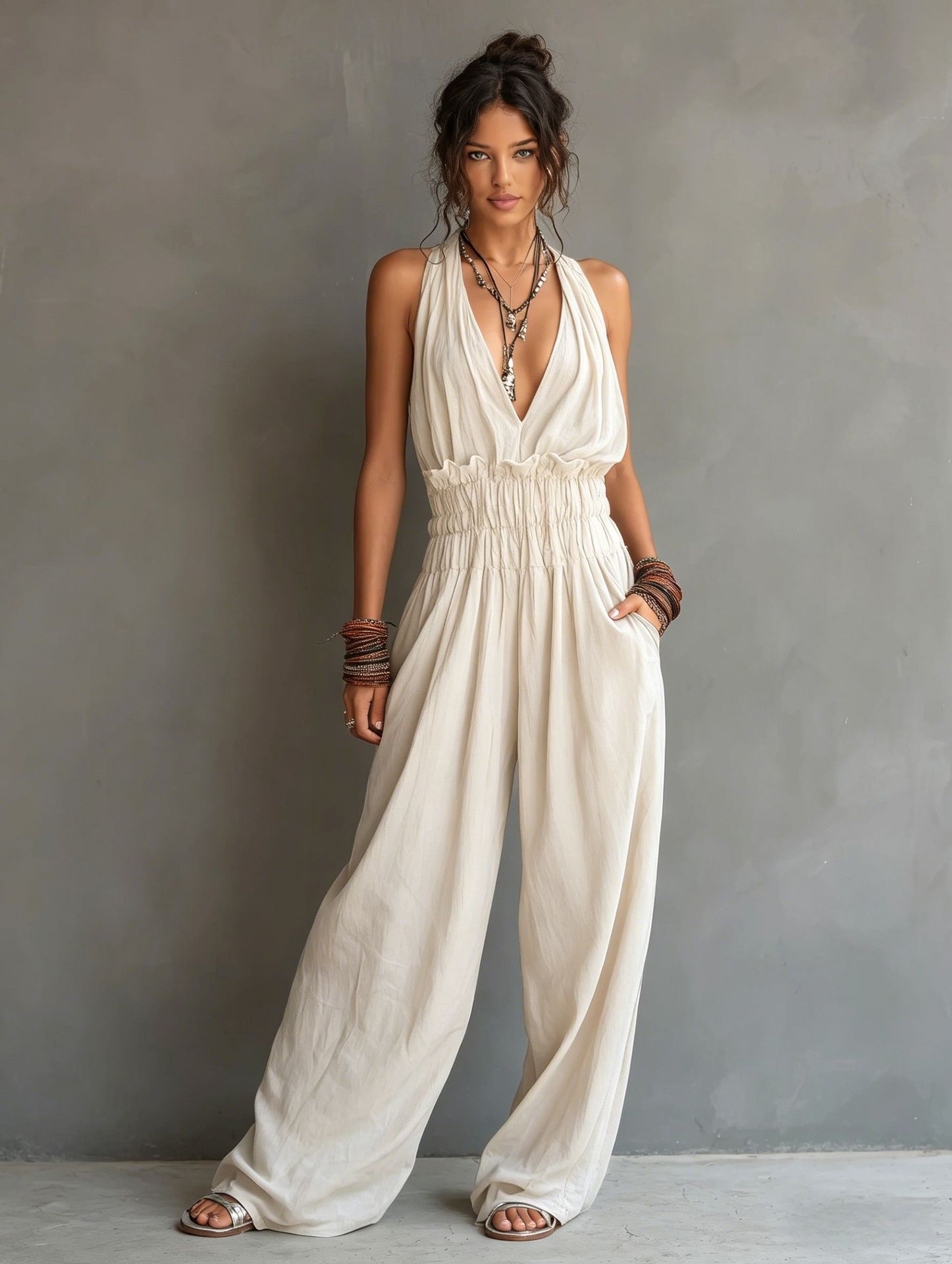 Women's open back jumpsuit in dark blue – lifestyle resort styling