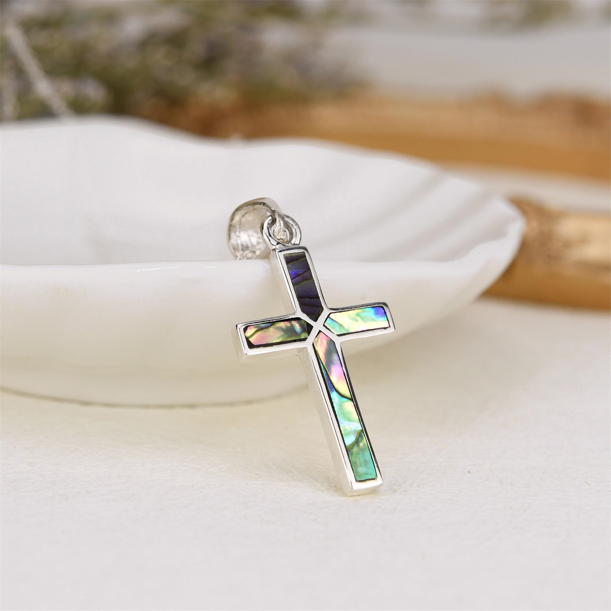 A Colorful Cross Pendant Necklace For Women Inlaid With Abalone Shell And Crafted From Stainless Steel
