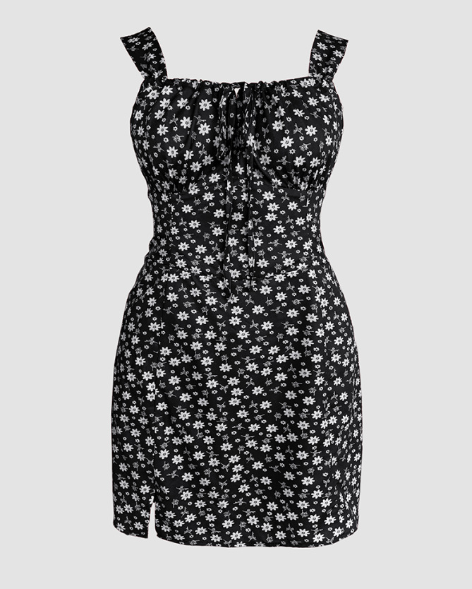 Women's cropped jumpsuit in black small floral, back view showing silhouette