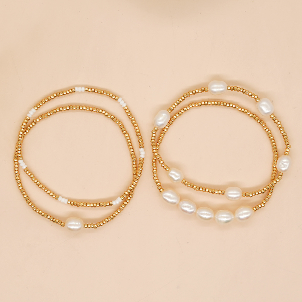 Affordable Luxury Pearl Bracelet A Chic Woven Gold-bead Accessory To Elevate Your Look