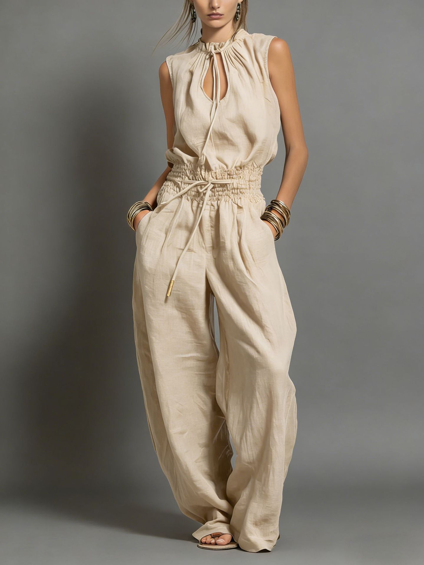 Women's sleeveless jumpsuit in blue, street style outfit photo