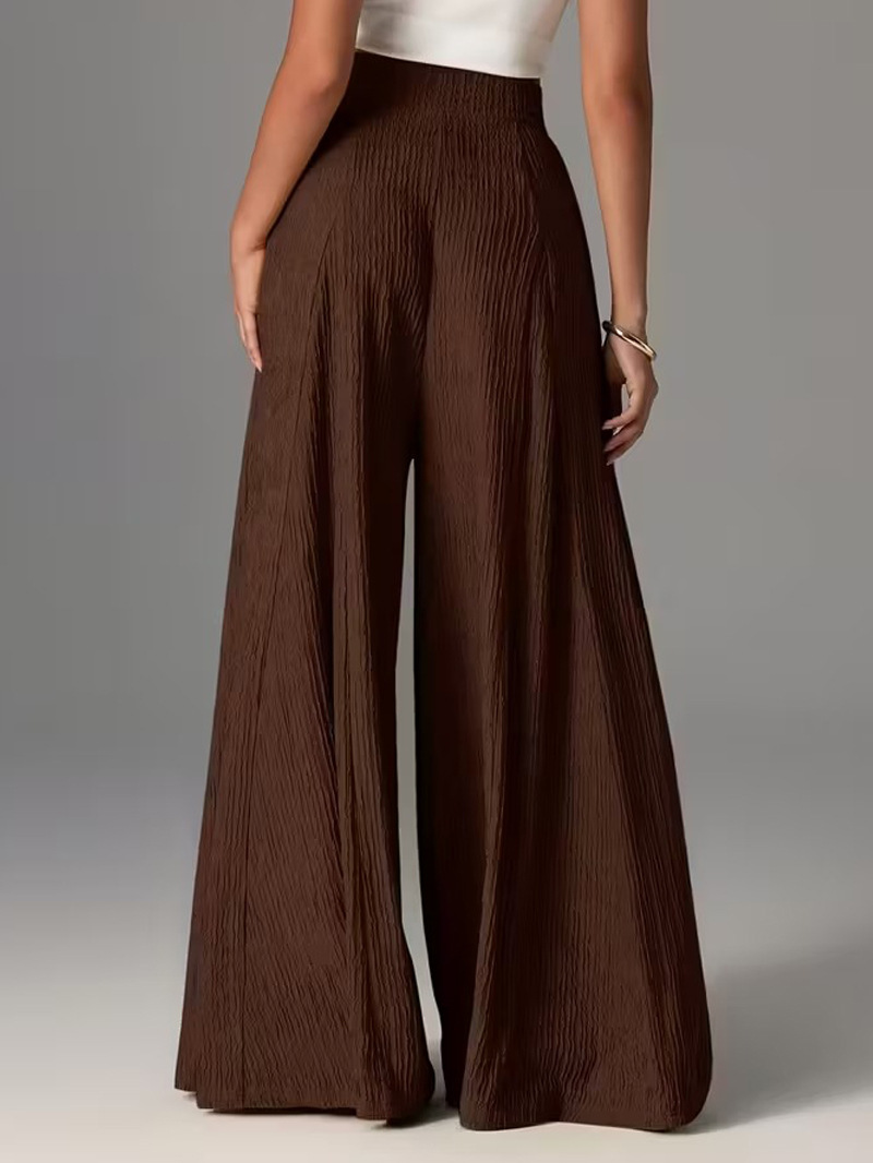 Pantalones holgados de color liso con cintura elástica y talle alto. 3ee2fe3f 7db8 4a70 84da 6601d3cd1887