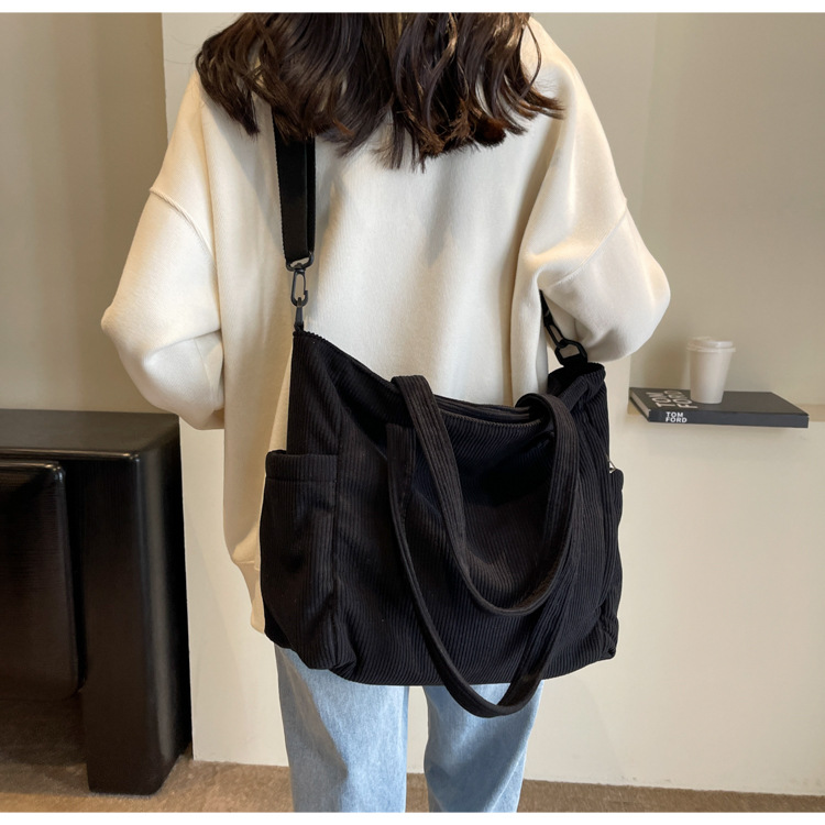 Large Capacity Art Student Shoulder Bag. Product information: Lining texture: Polyester, Applicable scenario: leisure travel, Color: creamy-white, green, black, Outer bag type: Sandwich pocket, Hardness: medium and soft, Material: corduroy, Suitcase shape