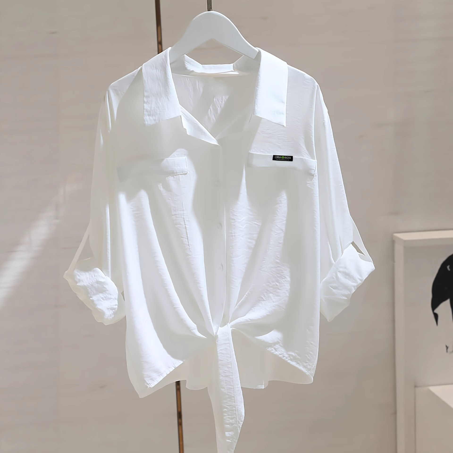 Stylish Womens Top With A Knotted Hem