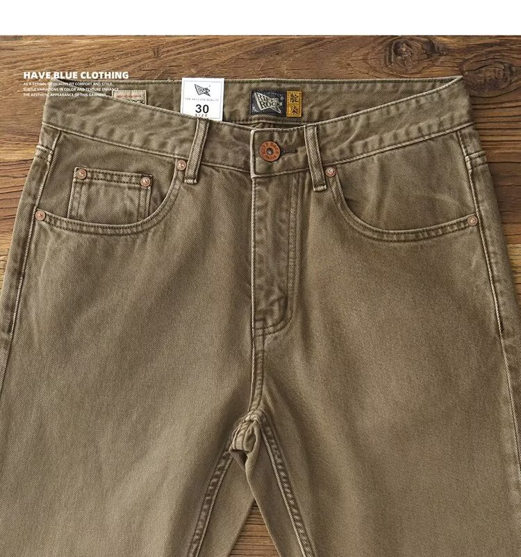 جينز رجالي أمريكي موديل شارع مع لمسة مستعملة وممزقة بتصميم عصري