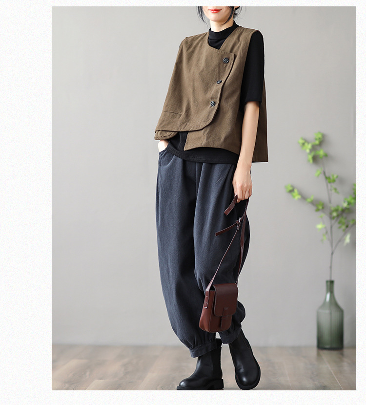 Women's elegant commuter cardigan vest – fabric texture and button detail close-up