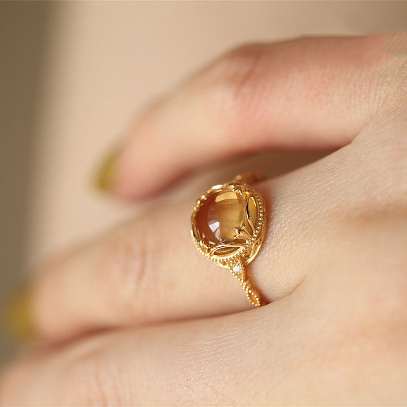 Title 5, Zhaocai Nafu Topaz Glass Egg Face Ring