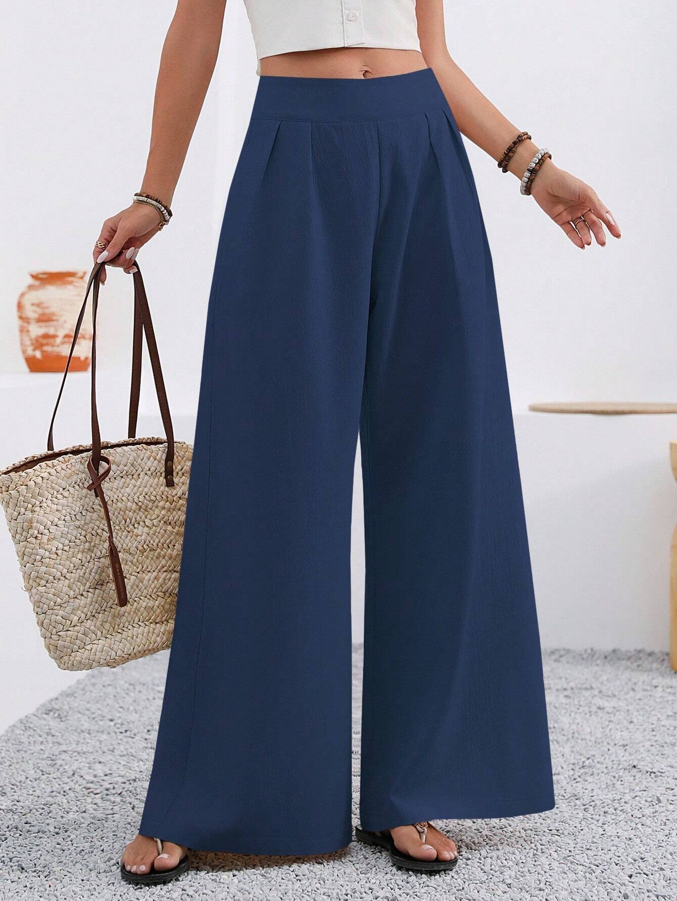 Women's high-waist trousers in rose red – styled outfit view