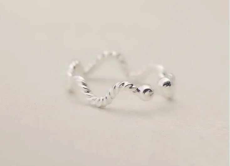 Title 6, Wave Twist Ring voor dames Elegantie en modern ...