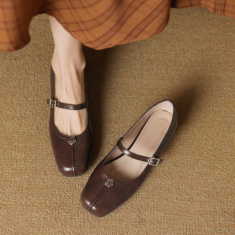 The Woman Is Wearing Low-heeled Mary Jane Shoes