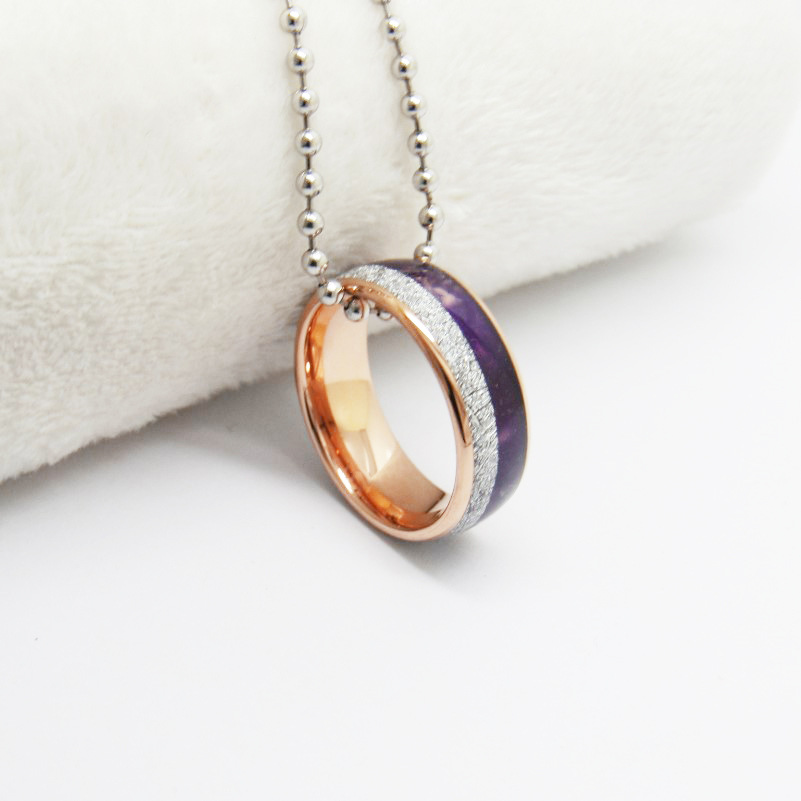 خاتم بسلك فضي مع حجر اللازورد الأرجواني وذهب وردي