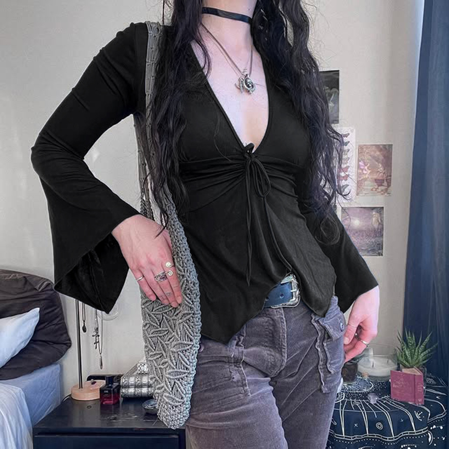 A Chic Dark-style Top Featuring An Asymmetrical V-neck