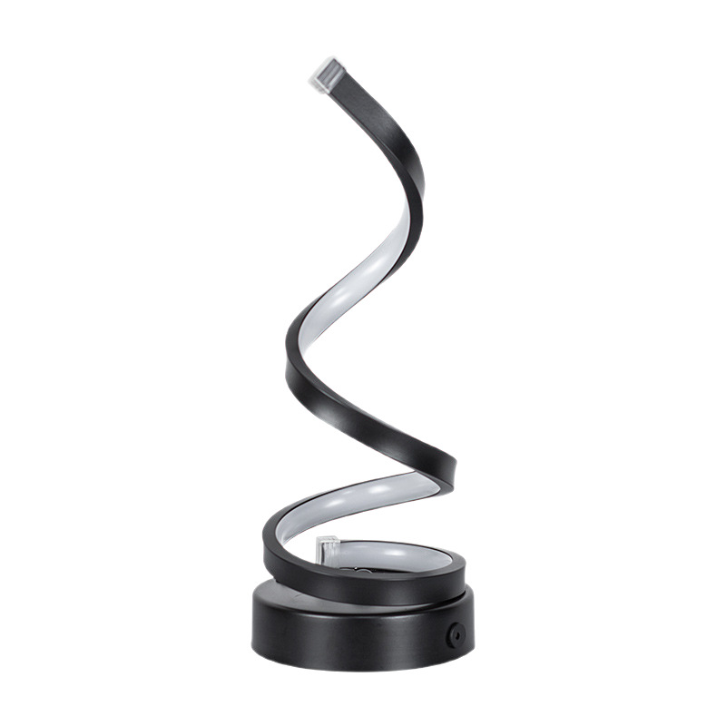 Sleek black spiral LED desk lamp against white background showing design