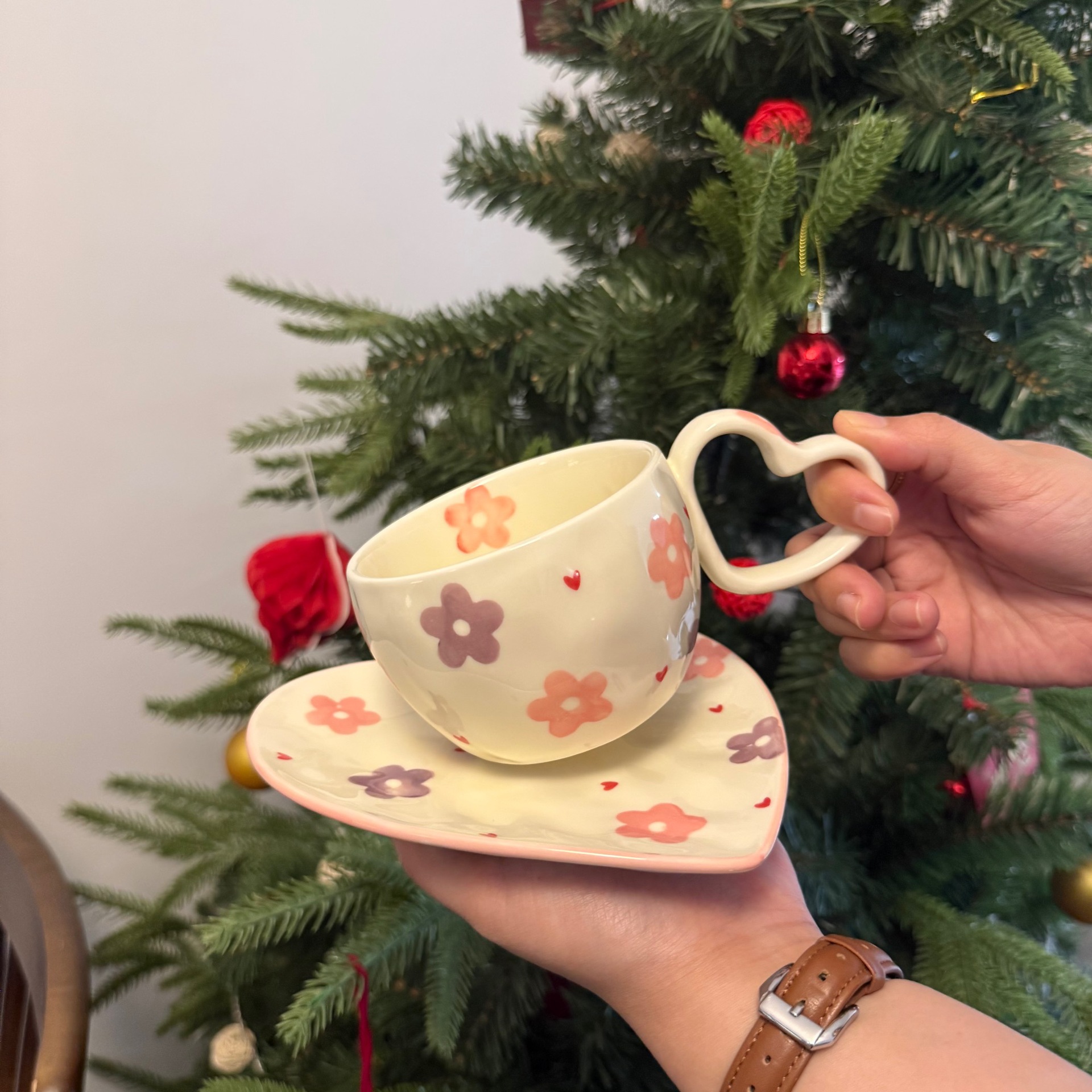 Bow tie pattern cup and saucer