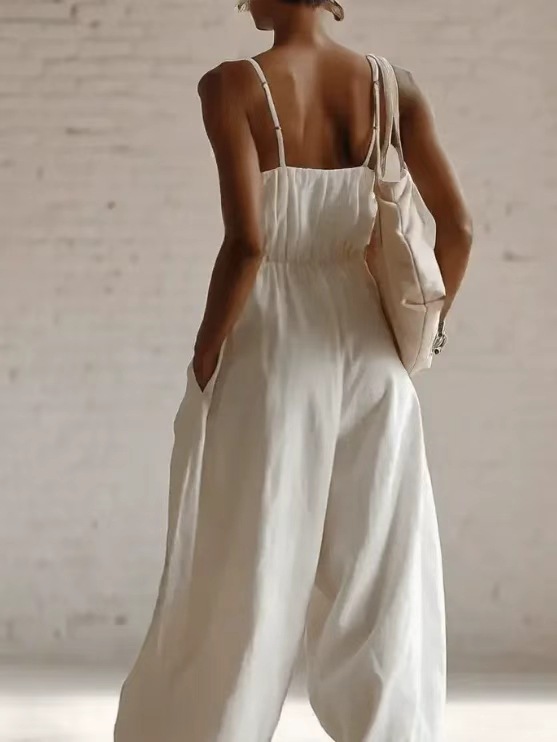 Women's sleeveless wide-leg flare jumpsuit in white – knit low waist one-piece