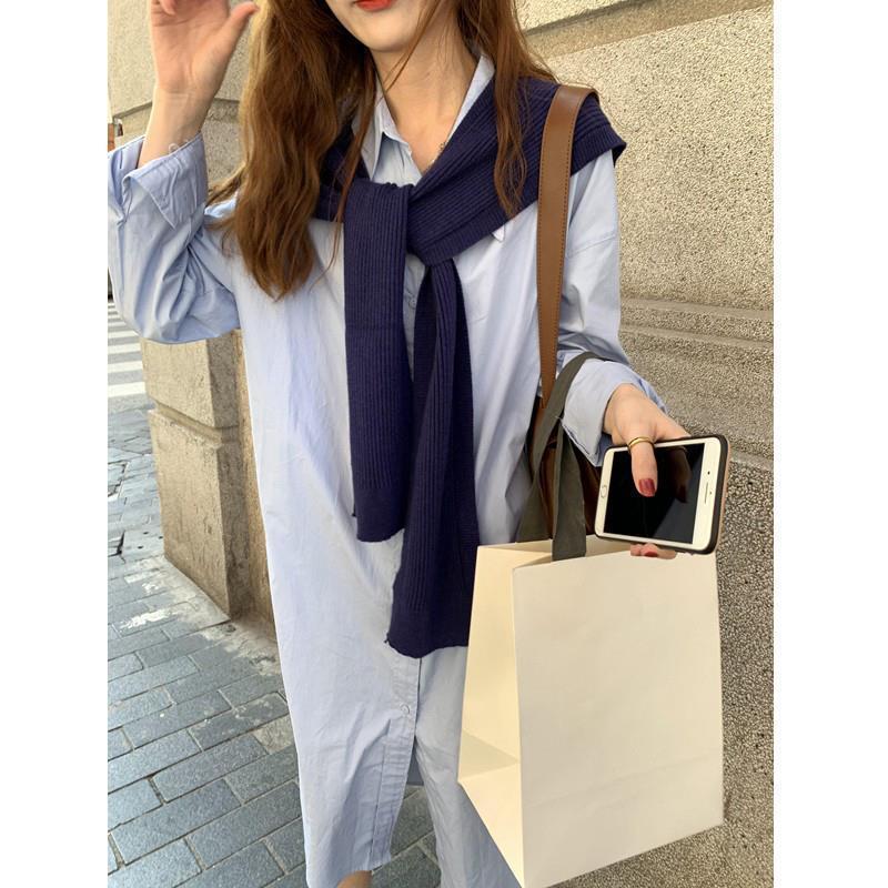 A Warm And Cozy Wool Shawl Or A Lightweight Cardigan That Can Be Layered