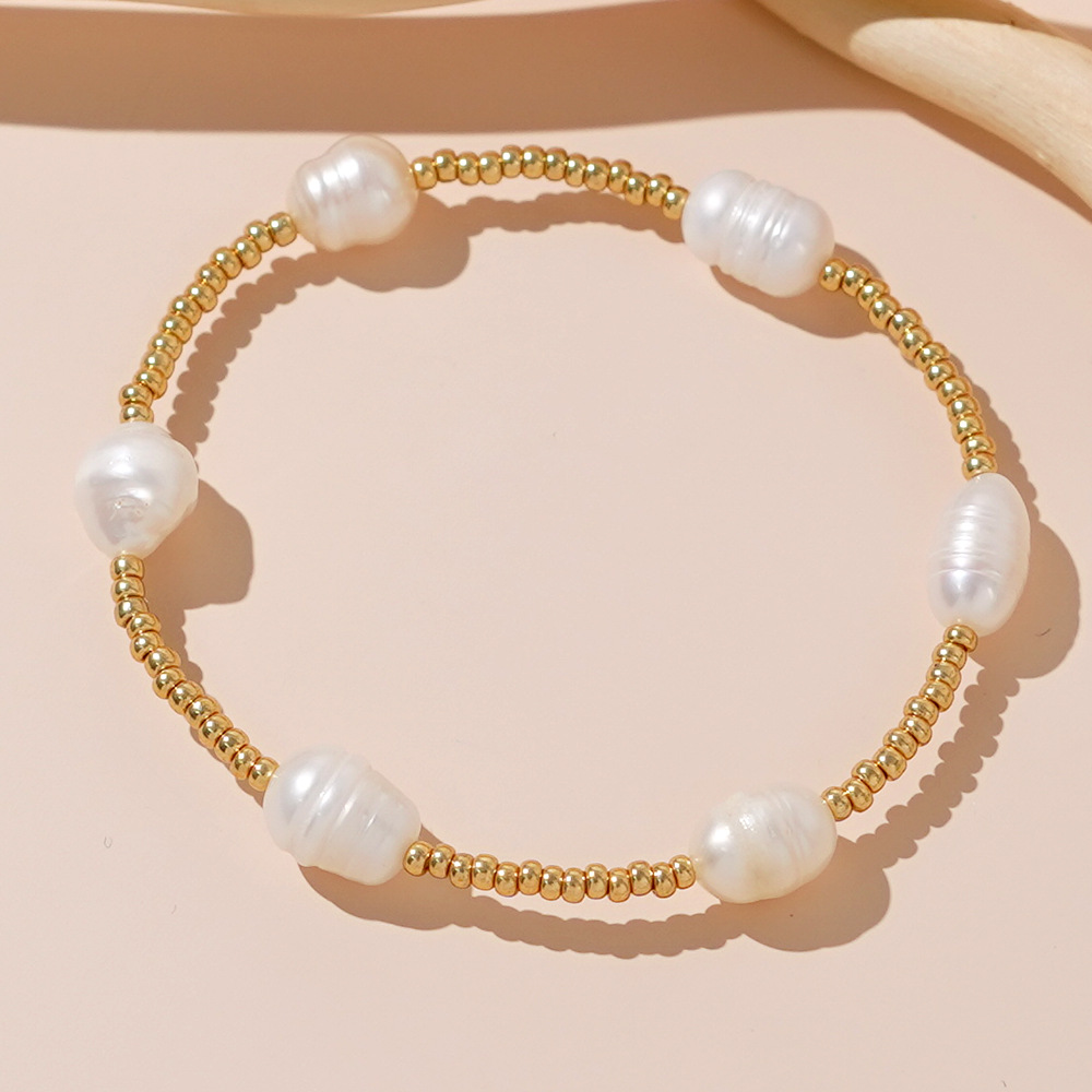 Affordable Luxury Pearl Bracelet A Chic Woven Gold-bead Accessory To Elevate Your Look