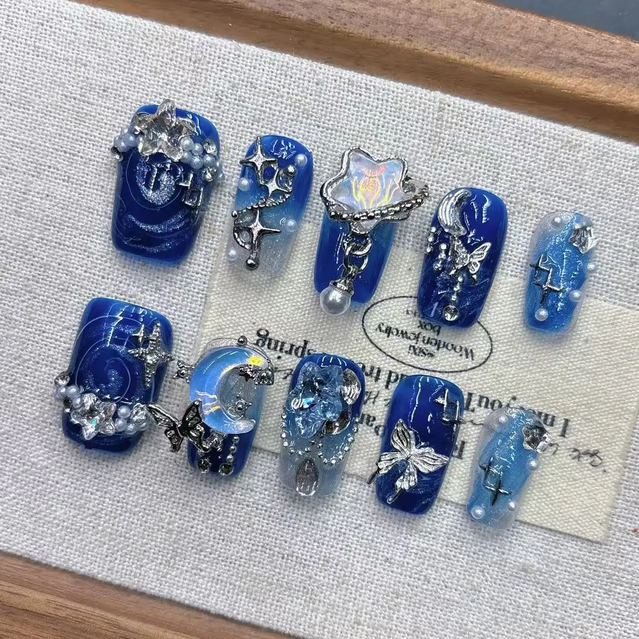 Handmade Blue Starry Night Nail Art With A Luxe Fair Toning Effect