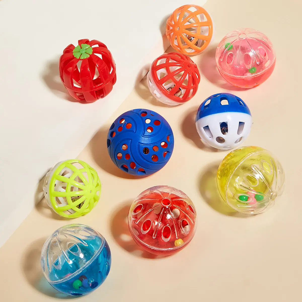 Colored Plastic Bell Mesh Hollow Sound Cat