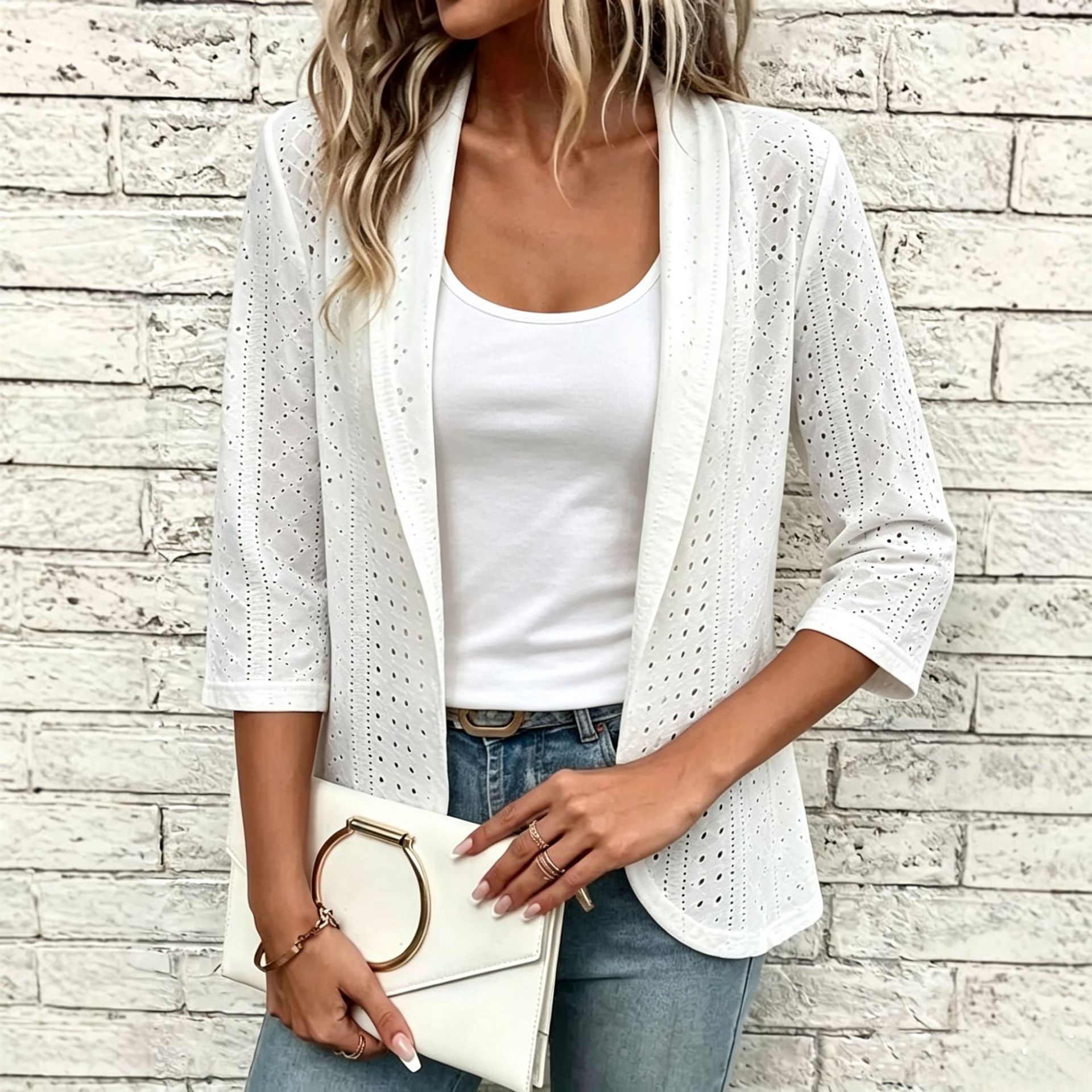 White eyelet blazer jacket – side view showing 3/4 sleeve rolled cuff and loose fit