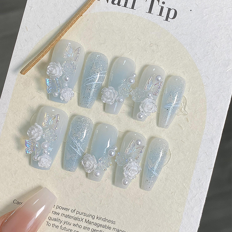 Handmade Wearable Nails In An Icy Translucent Camellia Design With A Blue-to-white Gradient