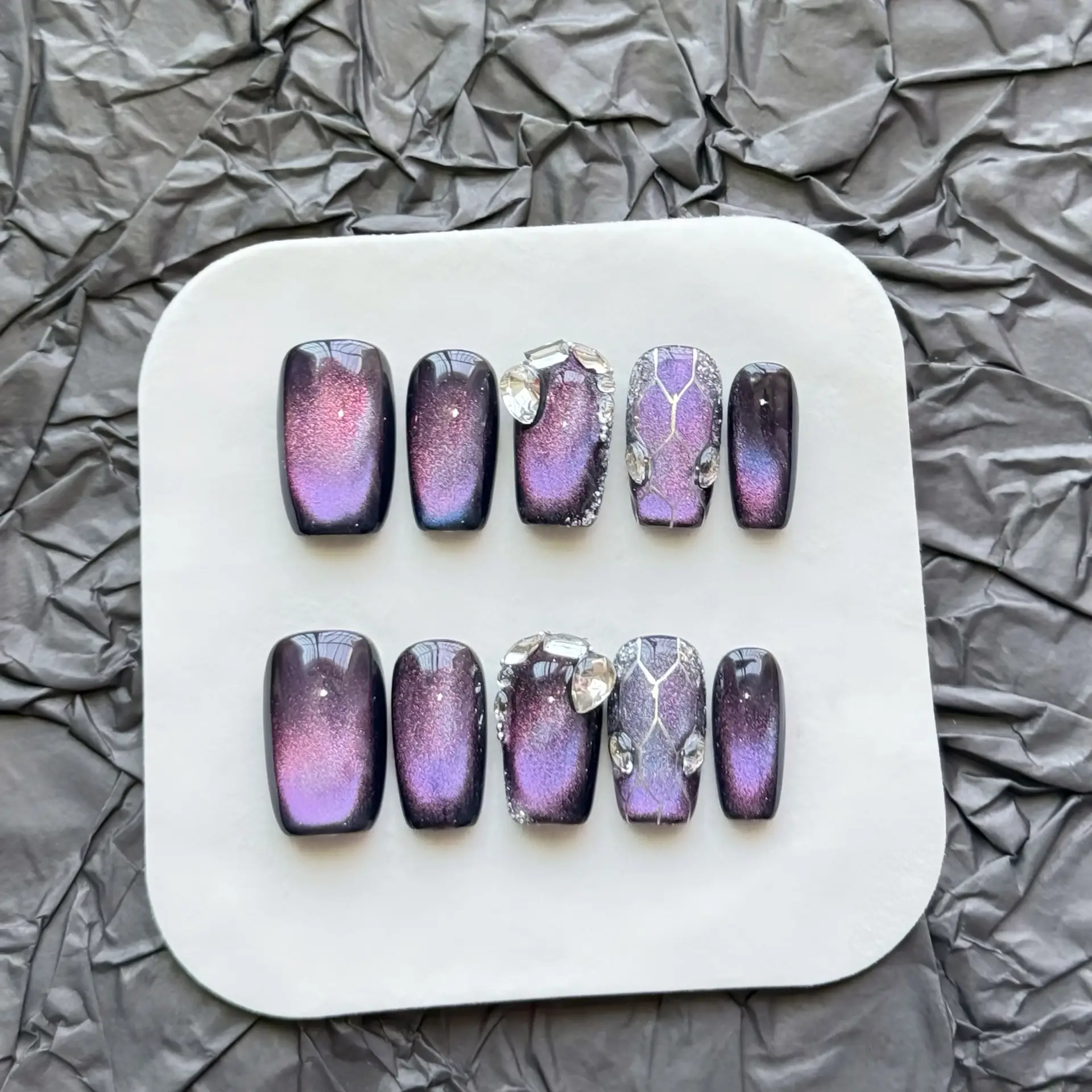 Elegant Purple Cat-Eye Nail Art
