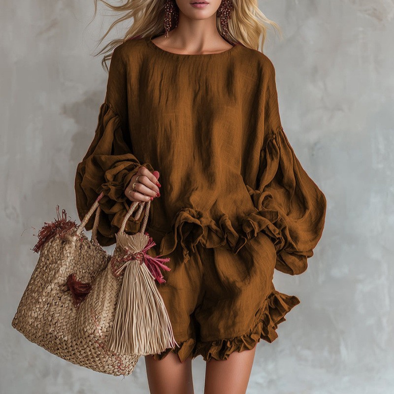 Women's lantern sleeve top and shorts two-piece set in black – loose fit front view