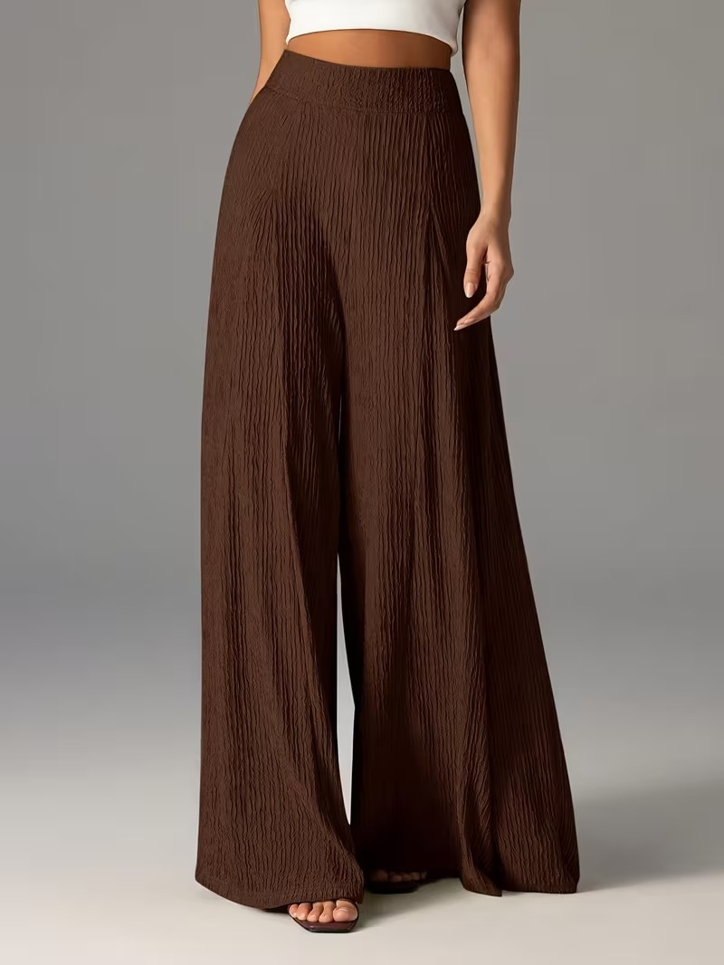 Pantalones holgados de color liso con cintura elástica y talle alto. 63cafb76 9943 4fe4 9ad9 0daca222c978